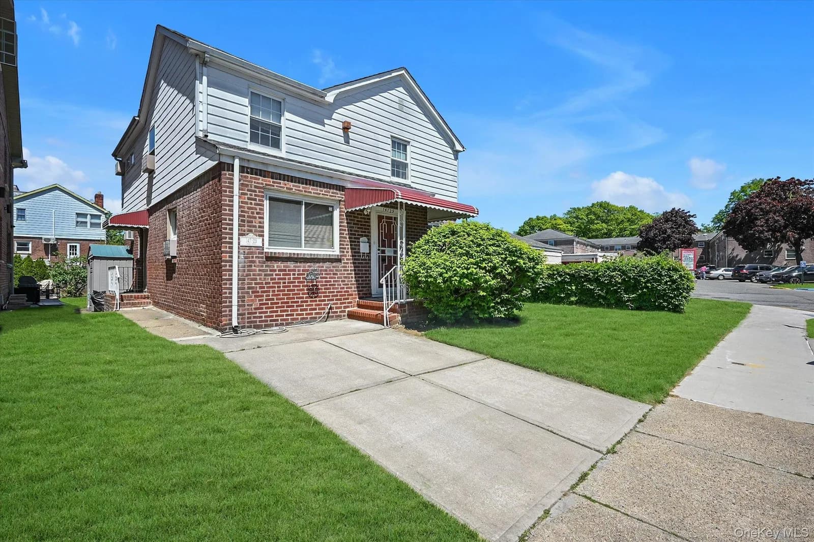 Single Family Residence in Kew Garden Hills, NY
