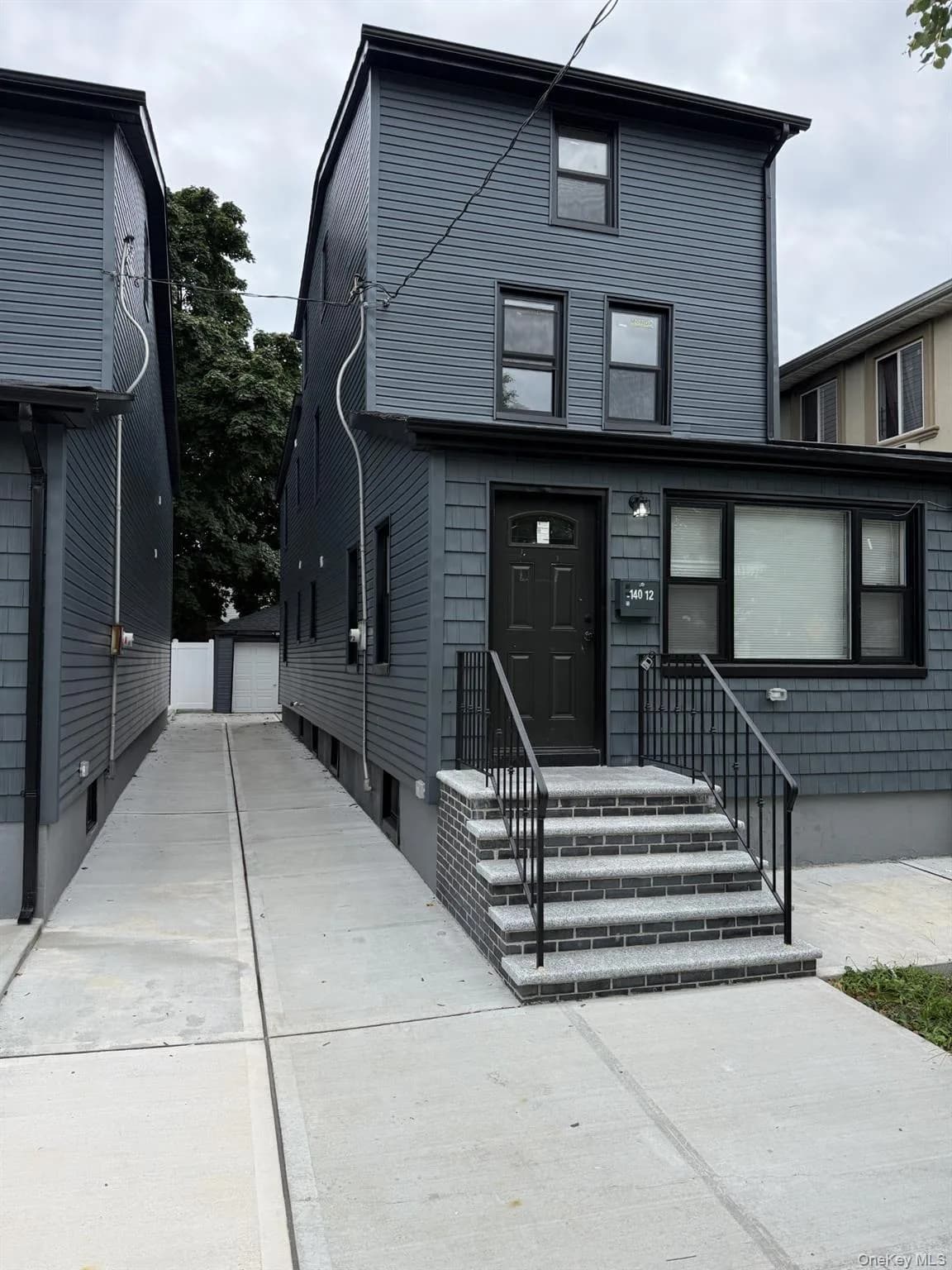 Single Family Residence in Jamaica, NY